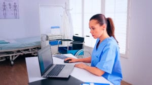 nurse-analysing-list-patients-laptop-therapist-typing-computer-consult-patient-online-medical-physician-medicine-uniform-writing-list-consulted-diagnosed-patients-making-research